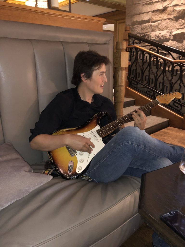 Caleb playing guitar